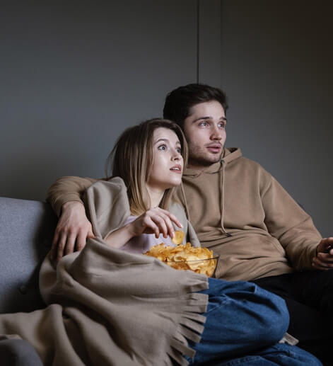 Couple shocked watching TV